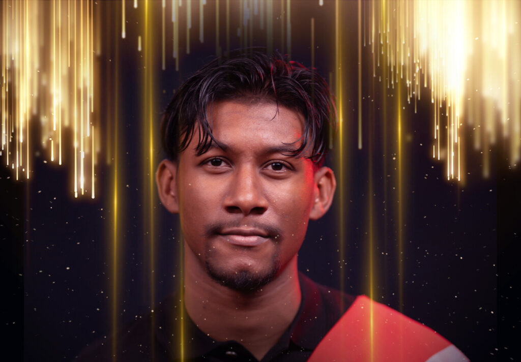 Nicholas Hanooman with trinidad and tobago flag