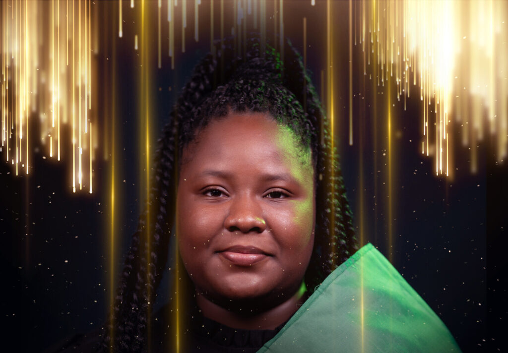 Akolya Gentle with Guyana flag