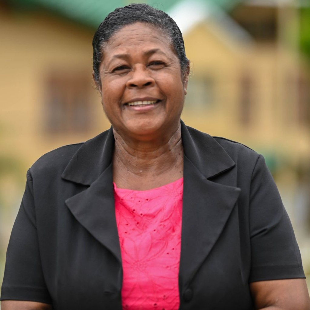 A photograph of Mrs Althea Darlington-Yearwood, the retiring Housekeeping Supervisor, who has dedicated over twenty years of service to maintaining the campus at the University of the Southern Caribbean.